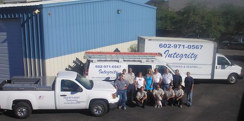 Integrity team-1 Integrity team by the trucks